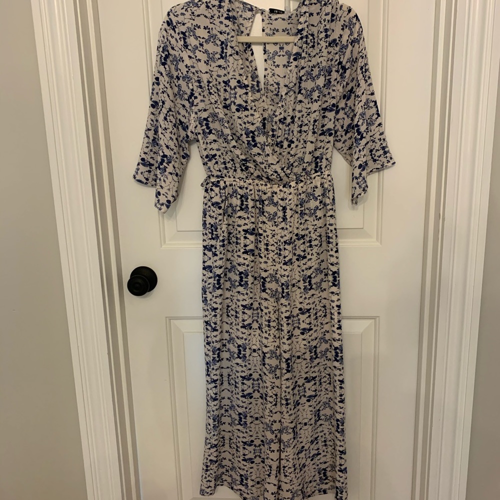 Floral jumpsuit with waist tie